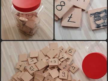 Selbst gemachte Zahlen auf Holzplättchen zum Rechnen am Schulzentrum Süd in Norderstedt